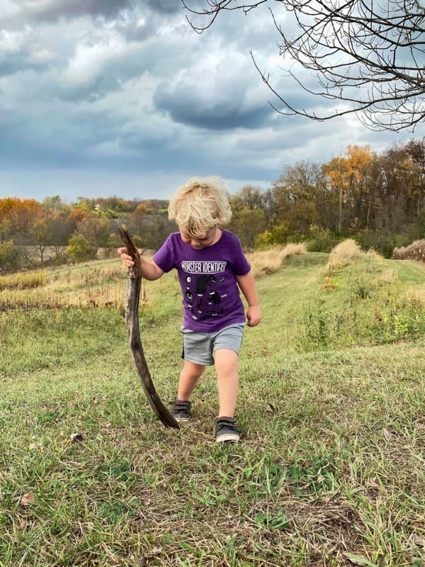 Two parents and a baby spending time together.